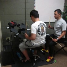 Two boys having drum lessons at 88 Keys Academy Arcadia