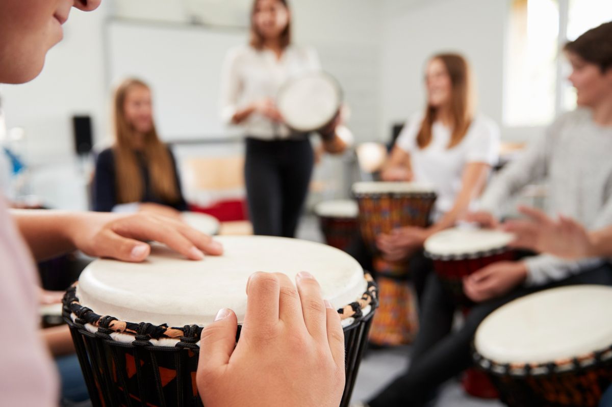 Learn How to Play an Instrument With Group Music Lessons